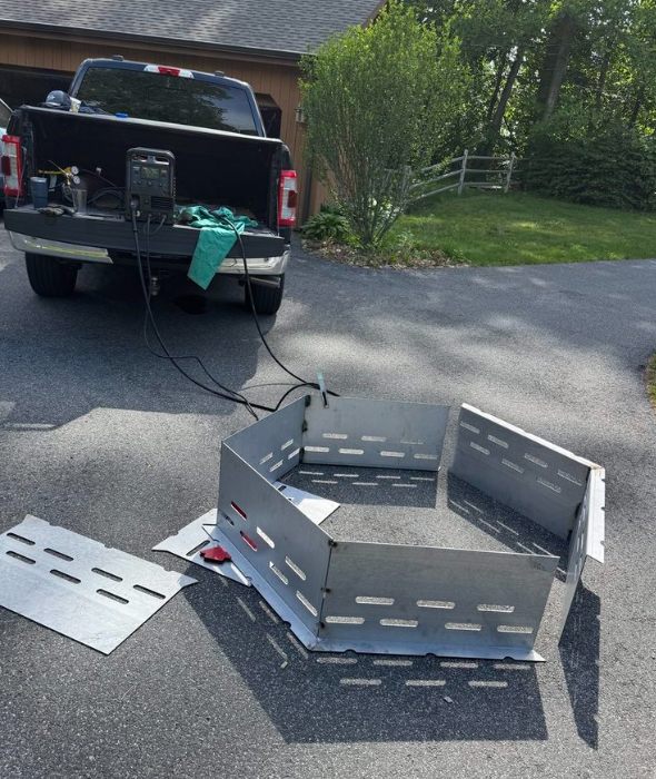 SES mobile welding rig fabricating a custom hexagonal fire pit on-site in Connecticut