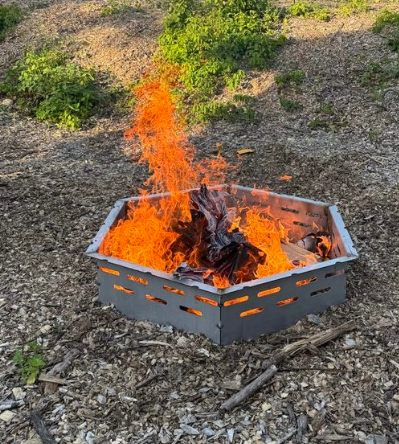 Finished custom hexagonal fire pit fabricated by SES Field Services